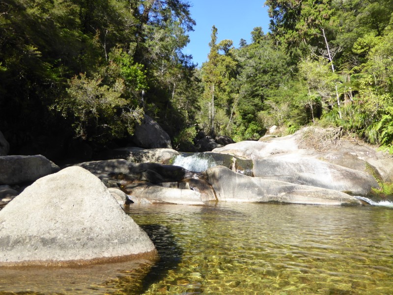 Rocks and clear water Able Tasman Track